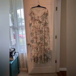 Established 1946 high low flowing dress.